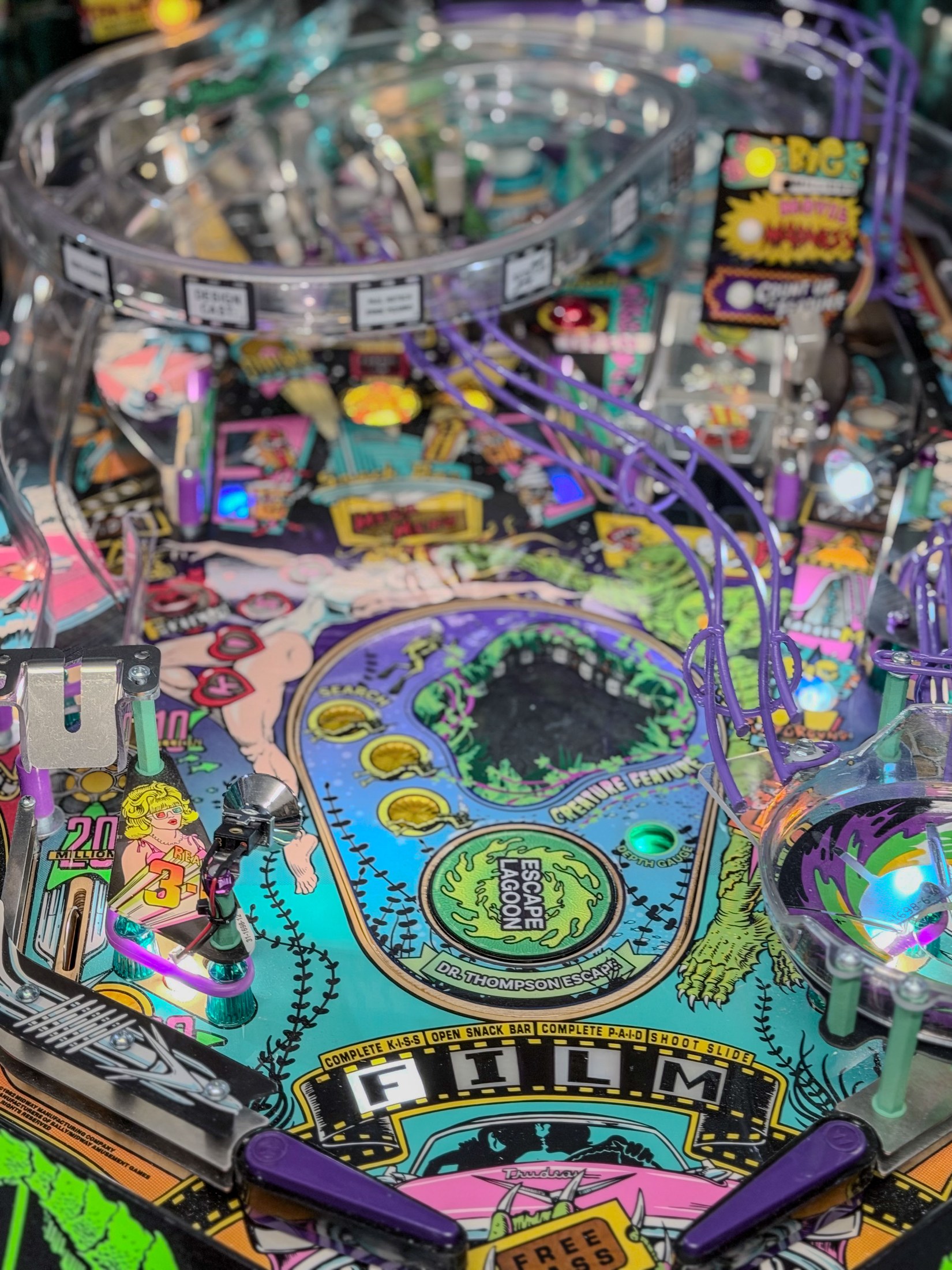 Illuminated Escape the Lagoon feature viewed across the playfield