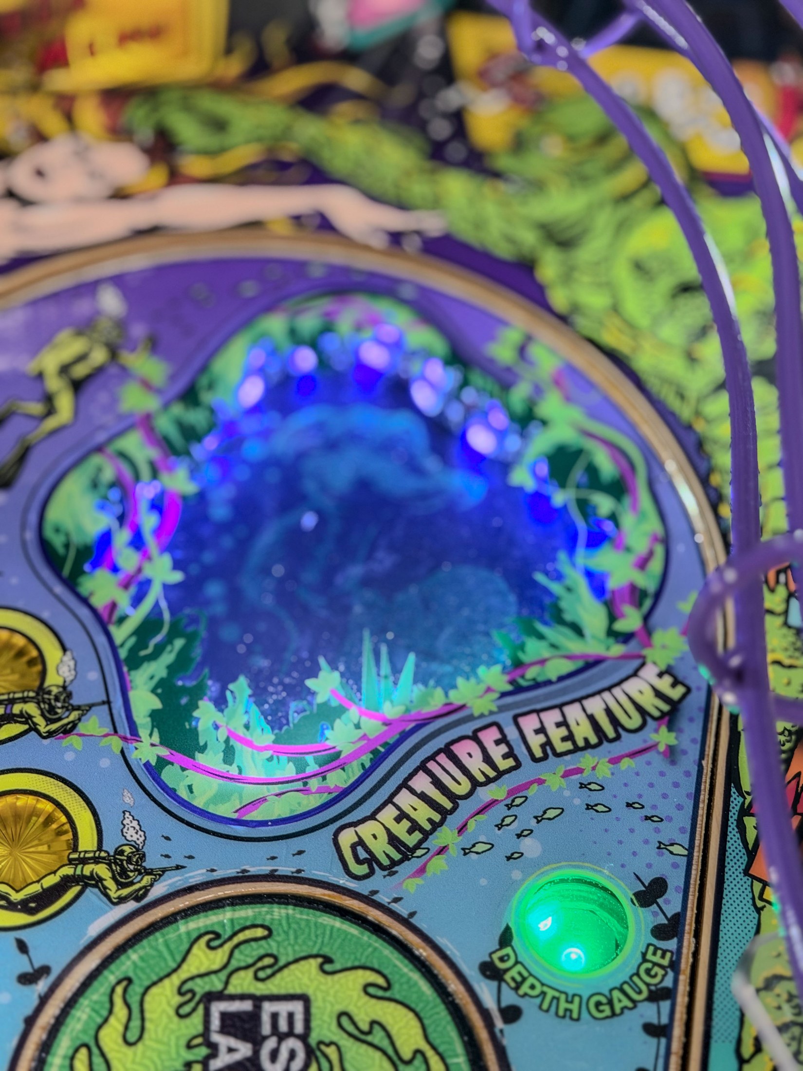 Blue-lit Creature artwork inside the Escape the Lagoon window