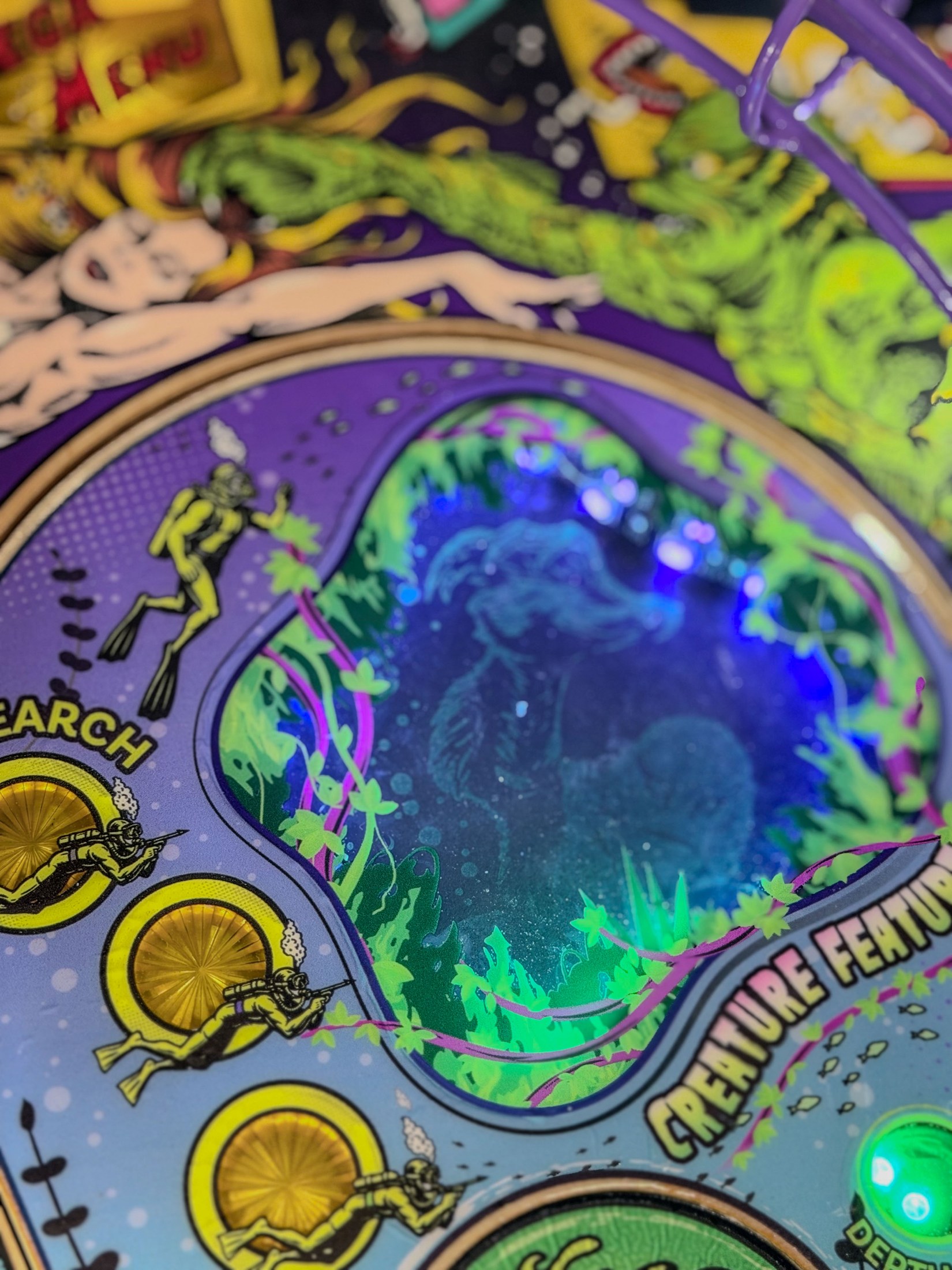 Close-up of the illuminated Creature behind the Escape the Lagoon window